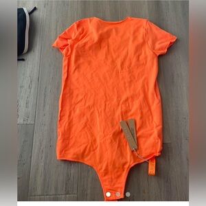 SKIMS Orange Bodysuit One Piece with Short Sleeves